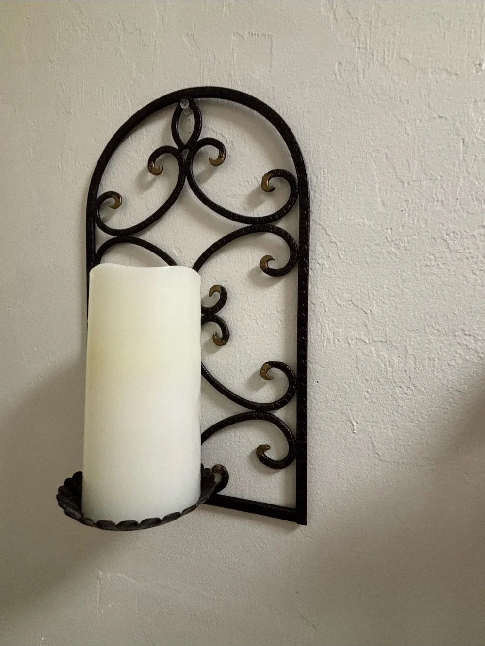 Two vintage iron scroll wall sconce candle holders
